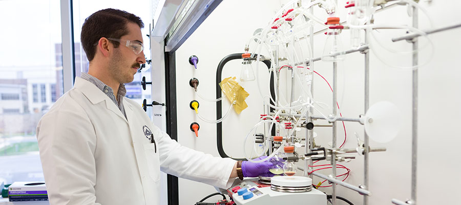 NCATS scientist in lab