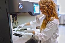 A HudsonAlpha team member prepares samples for DNA analysis. Photo courtesy of the HudsonAlpha Institute for Biotechnology.